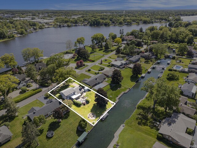 23337 Shorelane, Elkhart, IN 46514 - aerial perspective of suburban area with a nearby body of water and property boundaries highlighted