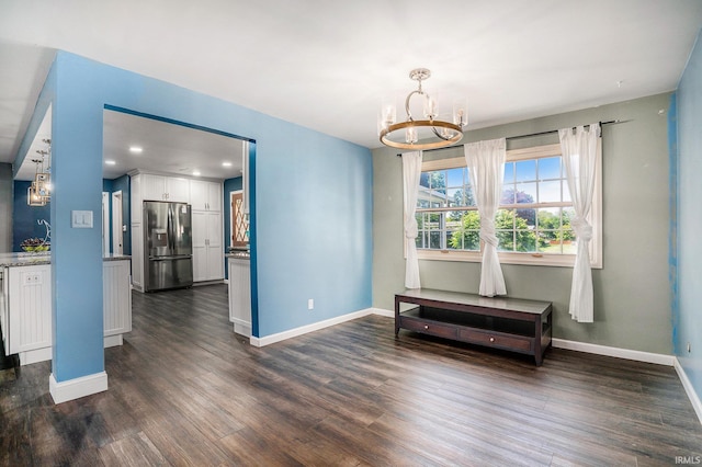 23337 Shorelane, Elkhart, IN 46514 - spare room with a chandelier, baseboards, dark wood-style floors, and recessed lighting