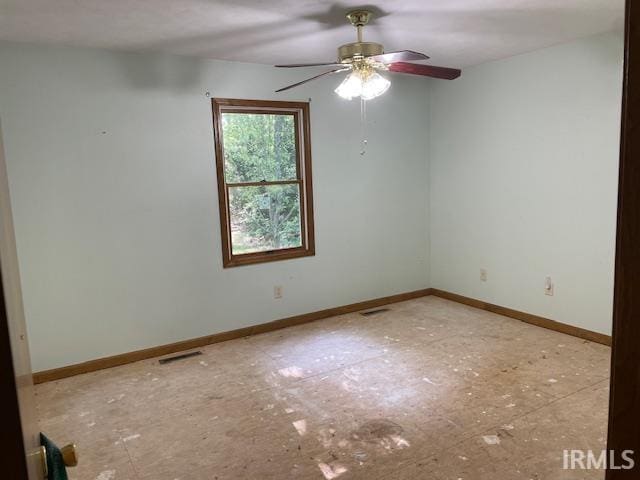 56862 Pomona St, Elkhart, IN 46516 - spare room featuring baseboards and a ceiling fan