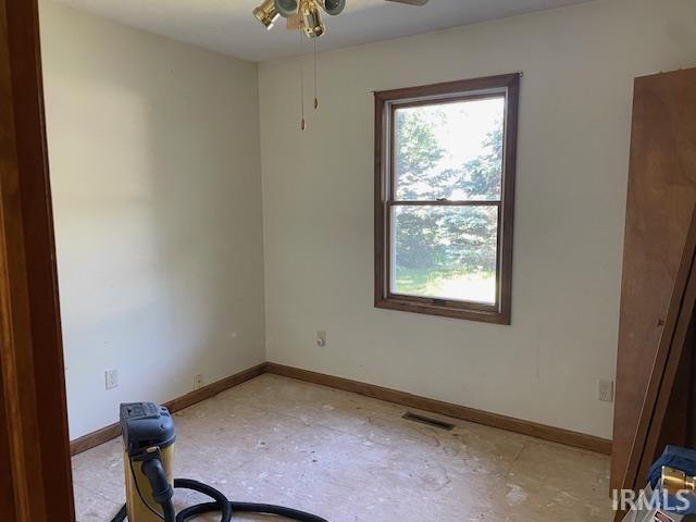 56862 Pomona St, Elkhart, IN 46516 - unfurnished room featuring ceiling fan and baseboards