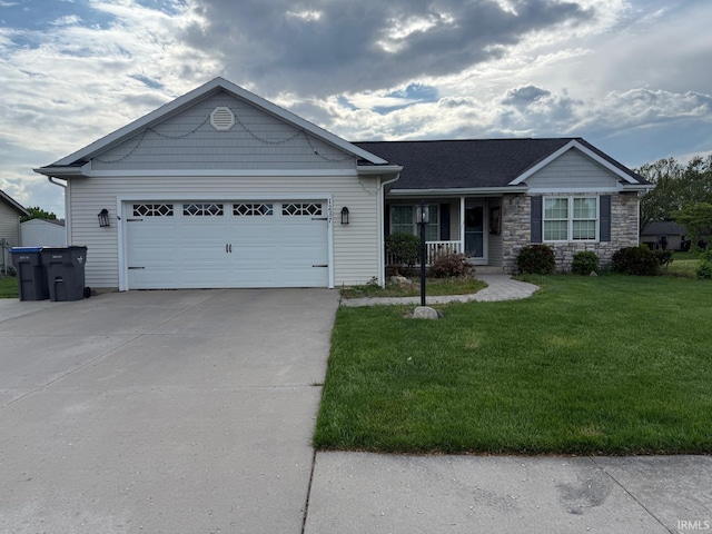 1237 Northstone Rd, Goshen, IN 46526 - ranch-style home with concrete driveway, covered porch, a front lawn, a garage, and stone siding