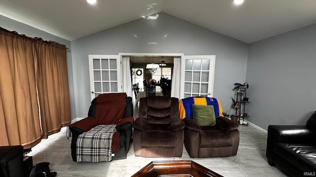 1237 Northstone Rd, Goshen, IN 46526 - living room featuring lofted ceiling, baseboards, and french doors
