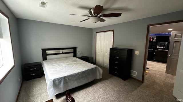1237 Northstone Rd, Goshen, IN 46526 - carpeted bedroom with a closet, a ceiling fan, and baseboards