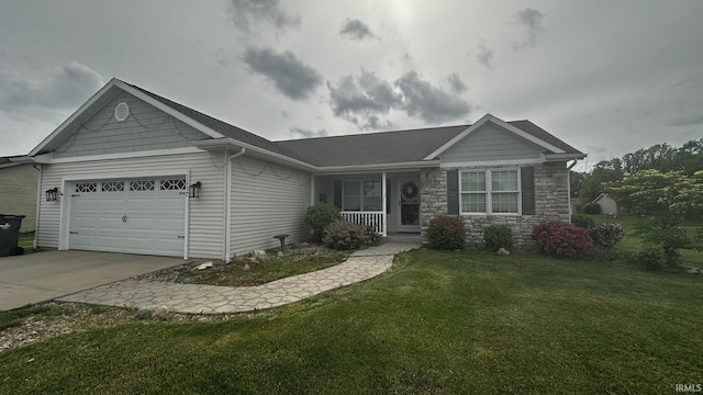 1237 Northstone Rd, Goshen, IN 46526 - single story home featuring an attached garage, concrete driveway, a front yard, stone siding, and a porch