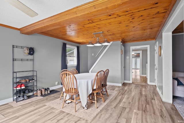 753 W Centennial St, Nappanee, IN 46550 - dining room featuring ornamental molding, light wood-type flooring, baseboards, and wooden ceiling