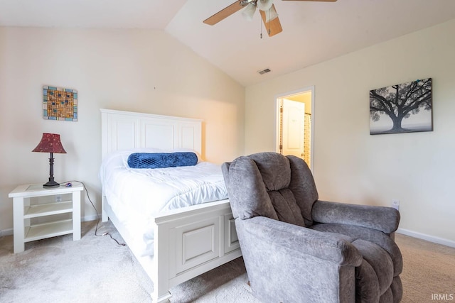 7203 W Capstone Cir, Bloomington, IN 47404 - bedroom with lofted ceiling, light carpet, baseboards, a ceiling fan, and ensuite bath
