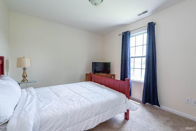 7203 W Capstone Cir, Bloomington, IN 47404 - bedroom featuring carpet flooring and baseboards