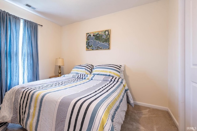 7203 W Capstone Cir, Bloomington, IN 47404 - bedroom with carpet floors and baseboards