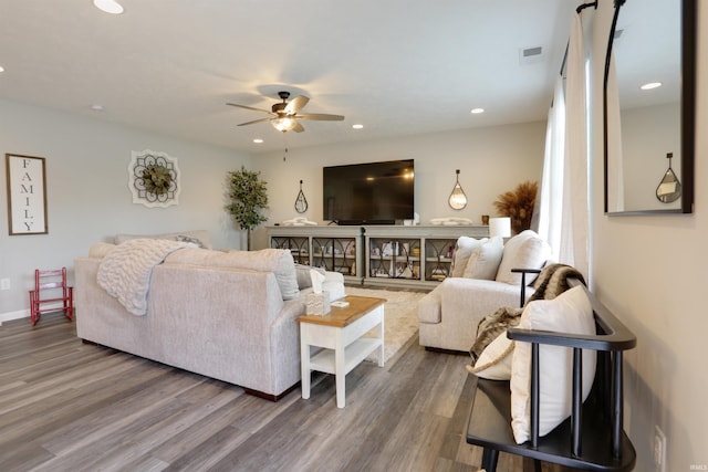 606 W Elm St, Haubstadt, IN 47639 - living area featuring a ceiling fan, wood finished floors, recessed lighting, and baseboards