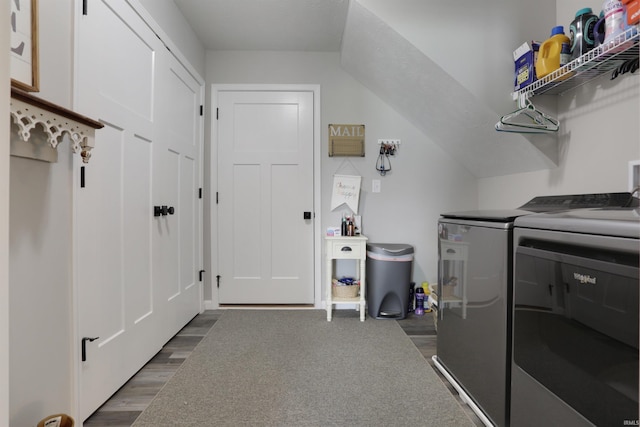 606 W Elm St, Haubstadt, IN 47639 - washroom featuring separate washer and dryer and dark wood-style flooring