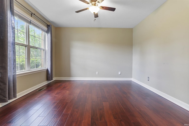 3746 Rolling Rock Dr, Evansville, IN 47711 - unfurnished room with a ceiling fan, dark wood-style floors, and baseboards