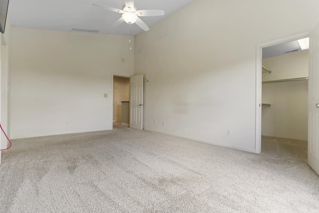 3746 Rolling Rock Dr, Evansville, IN 47711 - unfurnished bedroom featuring carpet flooring, a spacious closet, baseboards, high vaulted ceiling, and a closet