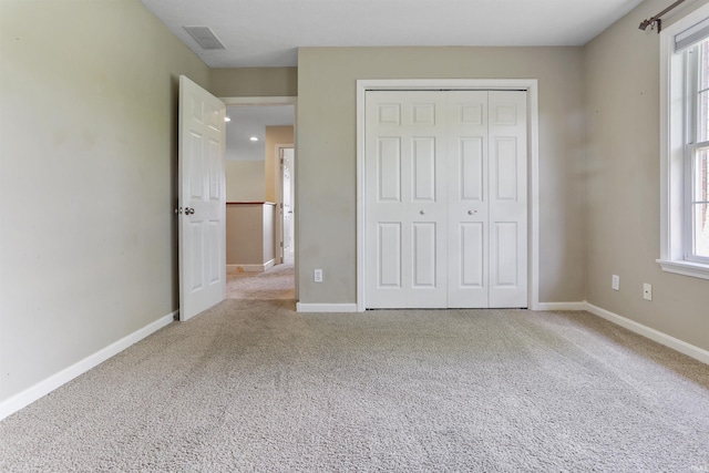3746 Rolling Rock Dr, Evansville, IN 47711 - unfurnished bedroom with a closet, carpet flooring, and baseboards