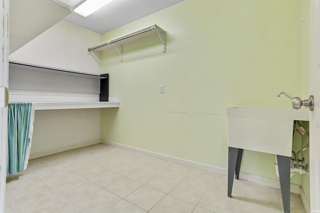 3746 Rolling Rock Dr, Evansville, IN 47711 - washroom with baseboards and tile patterned floors