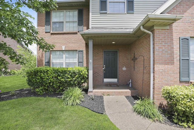3746 Rolling Rock Dr, Evansville, IN 47711 - doorway to property with brick siding and a lawn