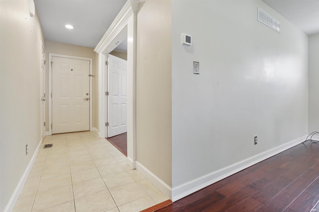 3746 Rolling Rock Dr, Evansville, IN 47711 - corridor featuring baseboards, recessed lighting, and wood finished floors