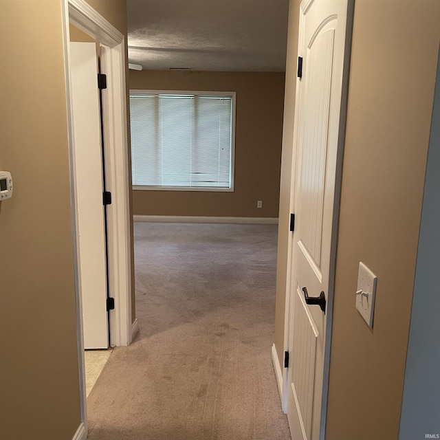 1841 S Patriot Dr, Yorktown, IN 47396 - hall featuring carpet flooring, baseboards, and a textured ceiling