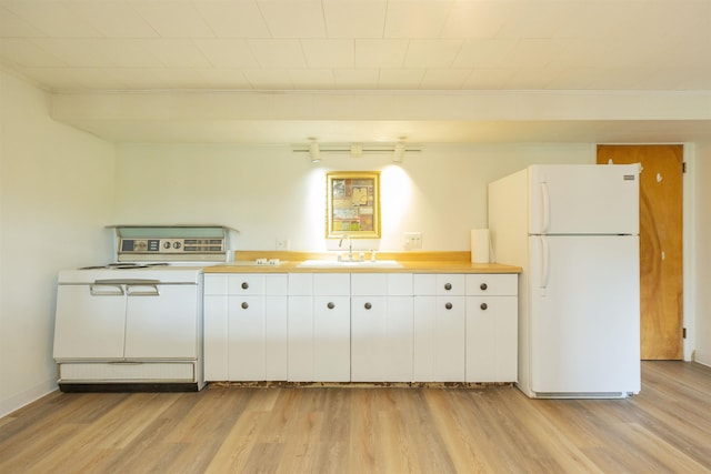 16128 Chandler Blvd, Mishawaka, IN 46544 - kitchen with range, freestanding refrigerator, a sink, and light wood finished floors