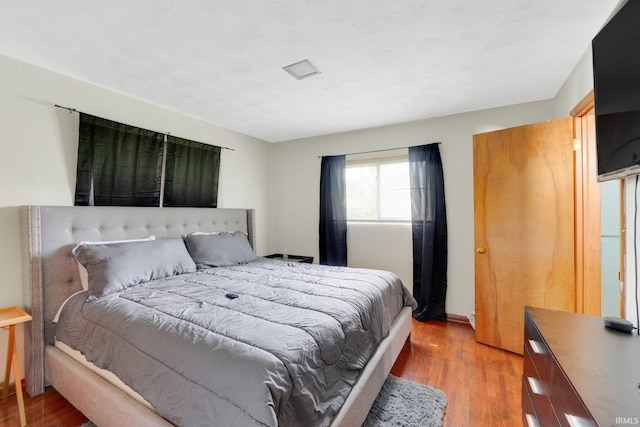 4893 Woodway Dr, Fort Wayne, IN 46835 - bedroom featuring light wood-style flooring