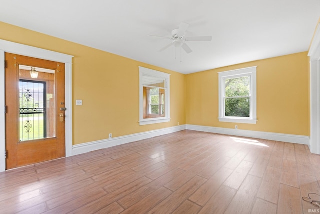 3550 Sandpoint Rd, Fort Wayne, IN 46809 - empty room featuring a ceiling fan, light wood-style floors, and baseboards