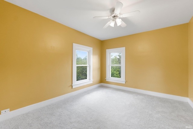 3550 Sandpoint Rd, Fort Wayne, IN 46809 - spare room featuring carpet floors, baseboards, and a ceiling fan