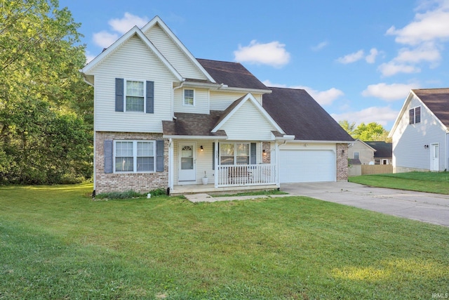 325 W Persimmon Ct, Bloomington, IN 47403 - traditional home featuring brick siding, covered porch, driveway, and an attached garage