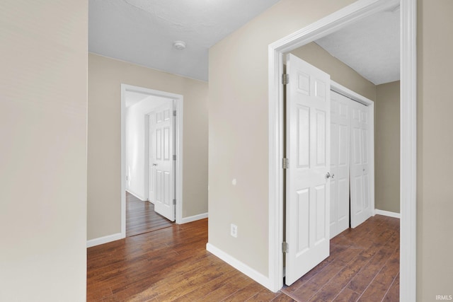325 W Persimmon Ct, Bloomington, IN 47403 - hallway featuring wood finished floors and baseboards