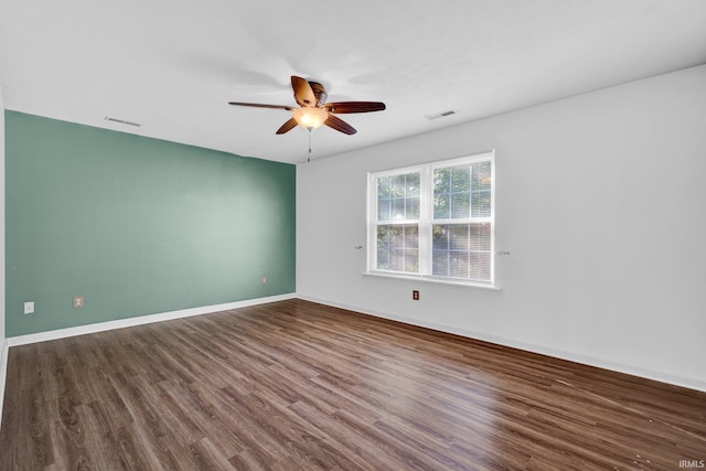 325 W Persimmon Ct, Bloomington, IN 47403 - empty room with ceiling fan, wood finished floors, and baseboards