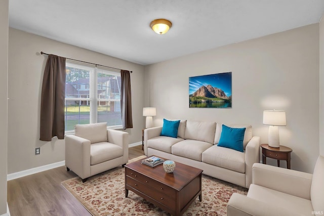 325 W Persimmon Ct, Bloomington, IN 47403 - living area with wood finished floors and baseboards