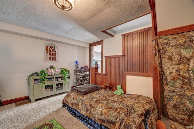 408 S Sale St, Ellettsville, IN 47429 - bedroom with a textured ceiling and carpet flooring