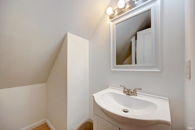 408 S Sale St, Ellettsville, IN 47429 - bathroom featuring vanity and lofted ceiling