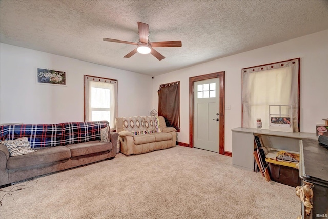 408 S Sale St, Ellettsville, IN 47429 - living room with carpet flooring, ceiling fan, healthy amount of natural light, and a textured ceiling