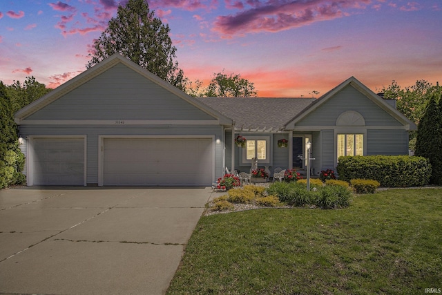 51040 Oak Lined Dr, Granger, IN 46530 - ranch-style home featuring driveway, a garage, and a yard