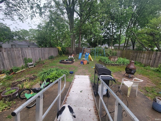 234 Alfred St, Elkhart, IN 46516 - fenced backyard featuring a playground