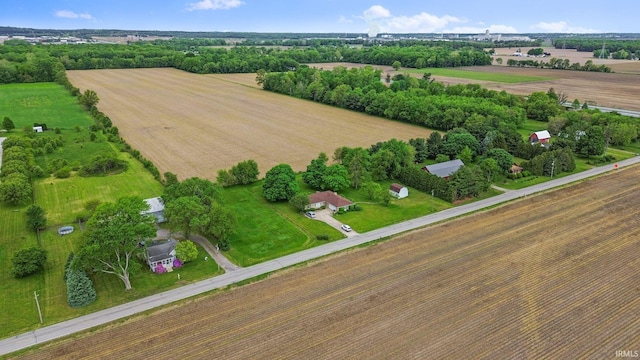 56729 Tulip Rd, New Carlisle, IN 46552 - aerial view of sparsely populated area featuring large plots for crops and a tree filled landscape