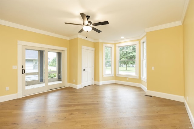 324 W Mishawaka Ave, Mishawaka, IN 46545 - spare room featuring a ceiling fan, light wood finished floors, ornamental molding, and recessed lighting