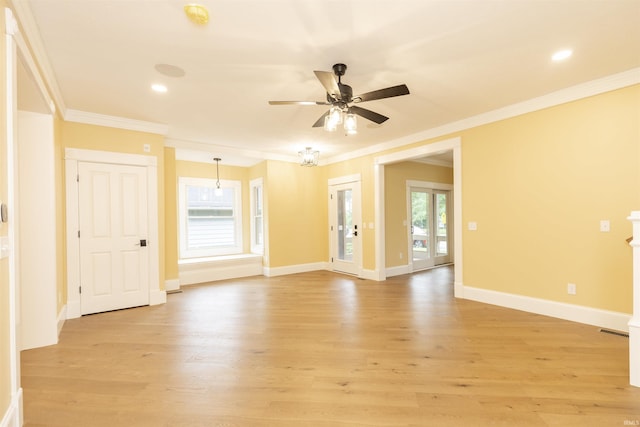 324 W Mishawaka Ave, Mishawaka, IN 46545 - unfurnished room featuring a ceiling fan, plenty of natural light, light wood-style flooring, ornamental molding, and recessed lighting