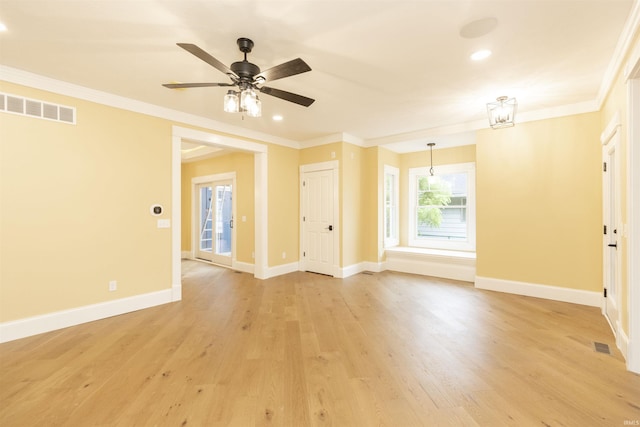 324 W Mishawaka Ave, Mishawaka, IN 46545 - unfurnished living room with a ceiling fan, crown molding, light wood finished floors, and recessed lighting
