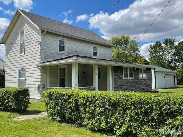 1242 Edwin St, Huntington, IN 46750 - view of front of property with a front lawn and covered porch