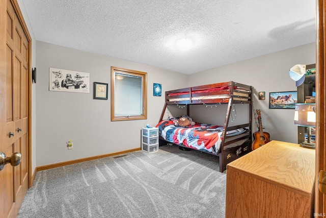 5318 Bedrock Ct, Fort Wayne, IN 46825 - carpeted bedroom featuring baseboards and a textured ceiling