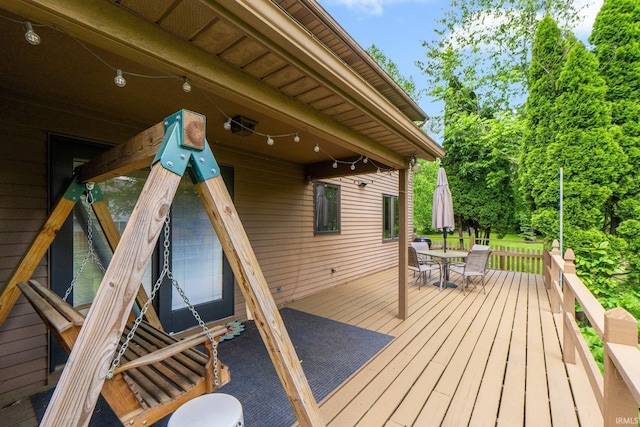 5318 Bedrock Ct, Fort Wayne, IN 46825 - wooden terrace featuring outdoor dining area