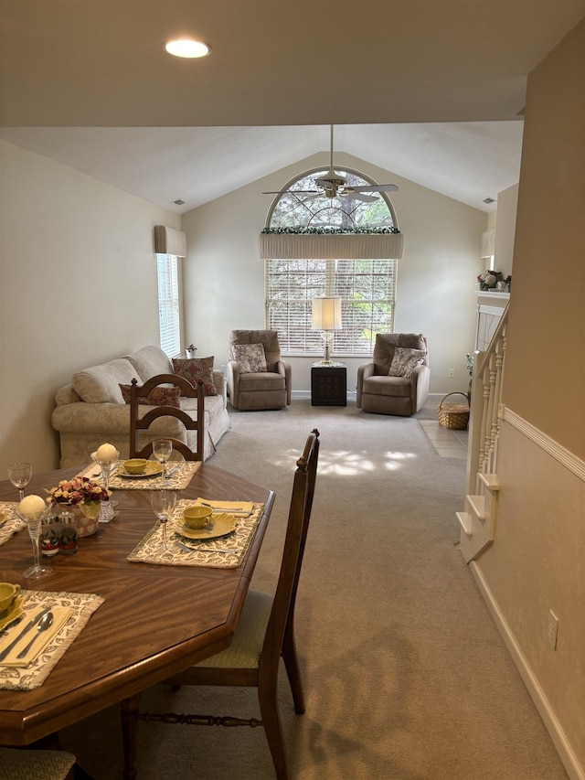 5242 Coventry Ln, Fort Wayne, IN 46804 - carpeted dining room featuring lofted ceiling, ceiling fan, and baseboards