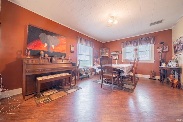 5026 N 450 W, Royal Center, IN 46978 - dining space featuring healthy amount of natural light, wood finished floors, crown molding, and baseboards