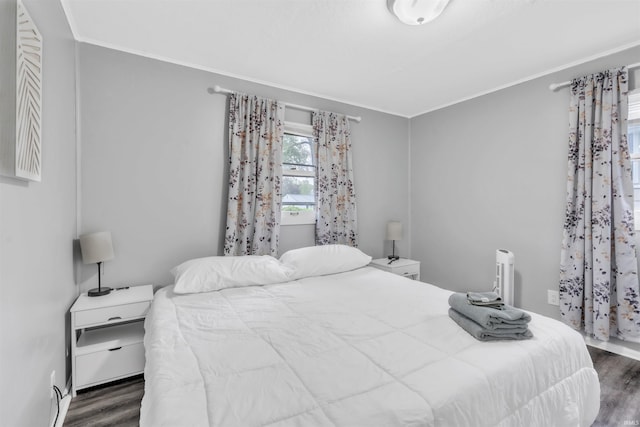 1122 Curdes Ave, Fort Wayne, IN 46805 - bedroom featuring wood finished floors and ornamental molding