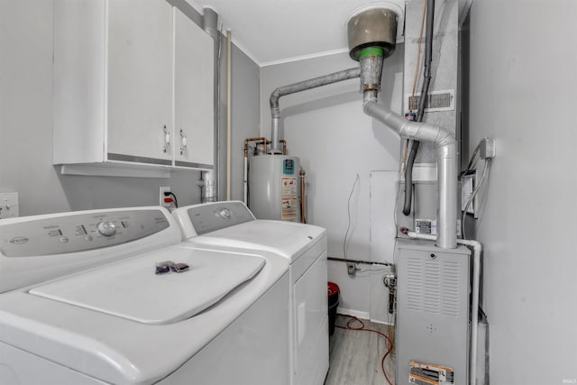1122 Curdes Ave, Fort Wayne, IN 46805 - washroom with independent washer and dryer, cabinet space, water heater, heating unit, and light wood-style floors