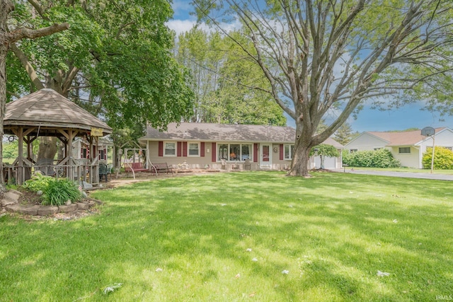 1402 W Chapel Pike, Marion, IN 46952 - ranch-style house with a gazebo, a front yard, and a garage