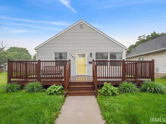 1346 Grayston Ave, Huntington, IN 46750 - view of front of house featuring a deck and a front yard