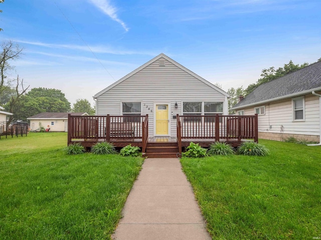 1346 Grayston Ave, Huntington, IN 46750 - view of front facade featuring a wooden deck and a front yard