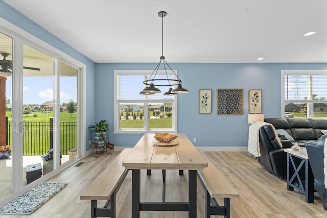 30860 Villa Dr, Granger, IN 46530 - dining space with light wood finished floors, baseboards, and recessed lighting