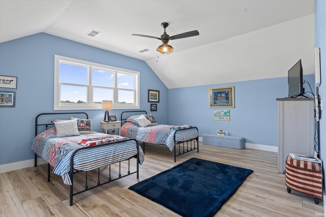 30860 Villa Dr, Granger, IN 46530 - bedroom featuring lofted ceiling, wood finished floors, ceiling fan, and baseboards